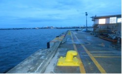 Blast and applied protective coating on bollard 